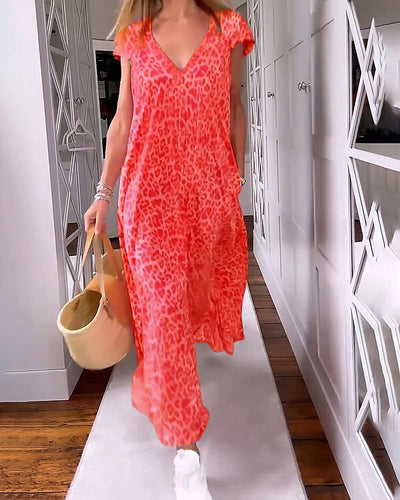 Noémie™ – Farbenfrohes Sommerkleid mit elegantem V-Ausschnitt und schicken kurzen Ärmeln